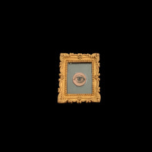 Load image into Gallery viewer, Small decorative frame with a central eye artwork on a dark background