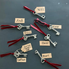 Load image into Gallery viewer, Santa’s Magic Key | Heavy Bronze Skeleton Key with Red Velvet Ribbon