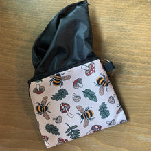 Load image into Gallery viewer, Closeup of a bee and Mushroom Ziipped Pouch with keychain.