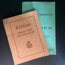 Load image into Gallery viewer, Two vintage legal documents or booklets on a dark background. The front booklet is tan with brown embossed text reading 'RITUAL IMPERIAL COURT DAUGHTERS OF ISIS' and a small emblem.