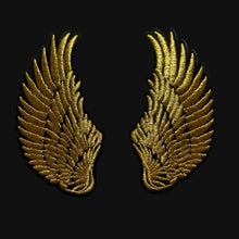 Load image into Gallery viewer, Two gold embroidered wing patches on a gray background