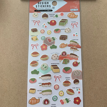 Load image into Gallery viewer, Embrace the art of letter writing with our Japanese Sweets Washi Paper Stationery Set. Made in Japan, this set includes notepaper, mini dessert stickers, coordinating washi tape, and mini washi envelopes, bringing elegance and fun to your correspondence.