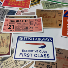 Load image into Gallery viewer, Add a touch of classic rock cool and international travel to your belongings with this pack of vintage-looking travel, concert, and sporting event ticket stickers! These stickers are perfect for embellishing laptops, luggage, water bottles, scrapbooks, notebooks, journals, and bikes.  The pack includes 48 high-quality decals