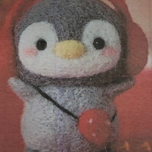 Load image into Gallery viewer, red earmuffs on penguin felt diy project, cute strawberry bag, fun project for teens.