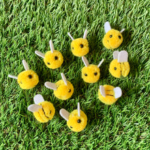 Load image into Gallery viewer, 10 mini yellow pom pom bees with felt wings for crafting and DIY projects.
Cute pom pom bumblebees perfect for scrapbooking, party favors, and home decor.