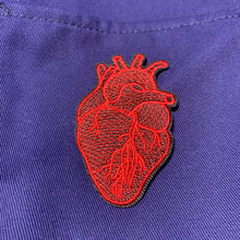 Load image into Gallery viewer, red anatomical heart patch on blue cloth