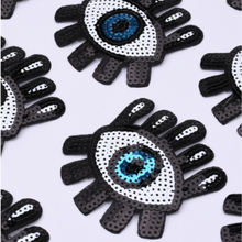 Load image into Gallery viewer, sequin wide eye blue eye with lashes patches. These patches measure 3&quot; x 3.5&quot; each, making them the perfect size to add to your clothes, bags, and shoes. These large patches are made of high-quality sequins .
