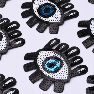 sequin wide eye blue eye with lashes patches. These patches measure 3" x 3.5" each, making them the perfect size to add to your clothes, bags, and shoes. These large patches are made of high-quality sequins .