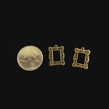 Load image into Gallery viewer, Two small decorative frames next to a quarter on a dark surface
