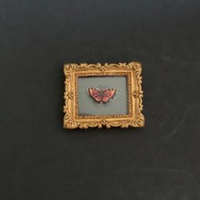 Load image into Gallery viewer, Small gold-framed picture with a butterfly on a dark background

