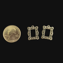 Load image into Gallery viewer, Two small decorative frames on a dark surface with a coin for scale.
