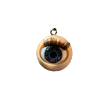 Load image into Gallery viewer, Blue Eye Blinking eyeball charm with lashes against a white background. 
