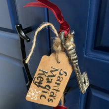 Load image into Gallery viewer, Santa’s Magic Key | Heavy Bronze Skeleton Key with Red Velvet Ribbon
