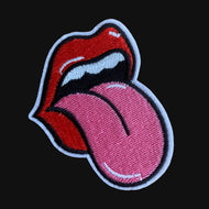 Close-up embroidered lips tongue patch detail