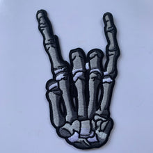 Load image into Gallery viewer, Gray embroidered iron-on skeleton hand patch
