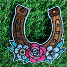 Load image into Gallery viewer, Embroidered Horseshoe Patch on Grass Background
