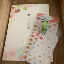 Load image into Gallery viewer, Delight stationery lovers with our Japanese Sweets Washi Paper Stationery Set. This set includes a 20-sheet pad of dessert-themed washi notepaper, mini dessert stickers, coordinating washi tape, and mini washi envelopes, making it a perfect gift for anyone who appreciates the beauty of Japanese culture and the art of letter writing.
