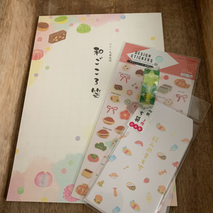 Delight stationery lovers with our Japanese Sweets Washi Paper Stationery Set. This set includes a 20-sheet pad of dessert-themed washi notepaper, mini dessert stickers, coordinating washi tape, and mini washi envelopes, making it a perfect gift for anyone who appreciates the beauty of Japanese culture and the art of letter writing.