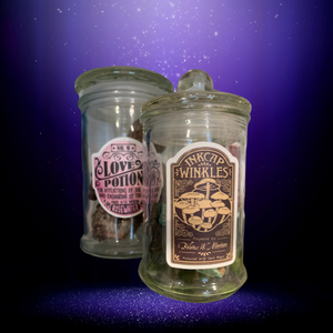Love Potion no. 9 Apothecary Jar. Glass Jar with rubber sealed lid. Glass finial. Love Potion no. 9 Decal. Mix with Rosewater to soothe afflictions of the heart. Valentines Day, Halloween decor.
