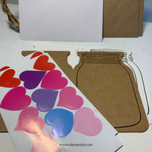 Load image into Gallery viewer, Each set of mason jar cards includes six cards (2 each black, kraft, and white), six envelopes, string, and six sheets of 12 heart stickers.
