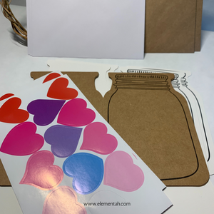 Each set of mason jar cards includes six cards (2 each black, kraft, and white), six envelopes, string, and six sheets of 12 heart stickers.