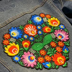 Mexican-style embroidered heart patch adds charm to your jackets, quilts, totes, and craft projects. Measuring a generous 7.75" x 7", it's a statement piece perfect for those who appreciate intricate, handcrafted details. Iron or sew on.