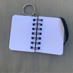 Tiny but mighty! These adorable keychain notebooks are your go-to for on-the-go lists. Never miss a detail with their compact design, measuring just 2.6" x 1.8". 