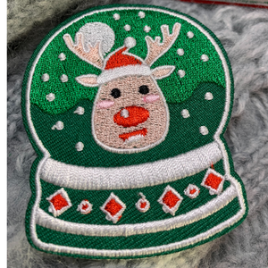 Elevate your holiday spirit and DIY creativity with our Christmas Decorative Embroidered Patches 6/pc set. This collection of festive patches features iconic Christmas symbols – a Christmas Tree, two Snowglobes, a Holiday Ornament, a calendar page, and Rudolph the Red-Nosed Reindeer – perfect for adding a touch of yuletide charm to your clothing, stockings, gifts, and of course, Ugly Sweaters.