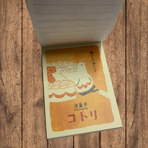 Charming mini note, stationery set combine style with function. 80-page notepad and coordinating envelopes. Features coffee, chicken, cake and black cat themes. Each set contains one 80-lined page notepad and eight coordinating envelopes. The notepad is Size 101 Envelope size Made in Japan.
