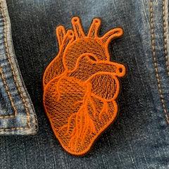 orange anatomical heart iron on patch