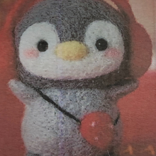 Load image into Gallery viewer, red earmuffs on penguin felt diy project, cute strawberry bag, fun project for teens.
