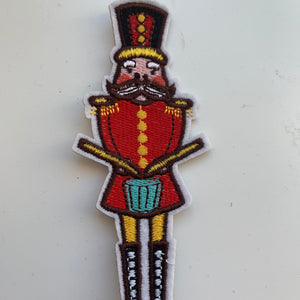 embroidered red drummer nutcracker iron-on patch