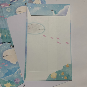  Whimsical Sealife Design: pretty blue envelopes adorned with a captivating white seal, penguins, dolphins, shells, jellyfish and other sea life illustrations, these envelopes bring a sense of enchantment to your letters.  Ten card stock notes fit perfectly inside - Very cute for mini notes to your spouse, boyfriend, girlfriend, or kids.