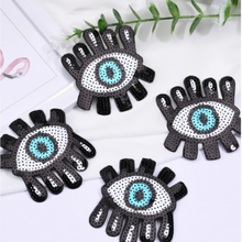 Load image into Gallery viewer, sequin wide eye blue eye with lashes patches. These patches measure 3&quot; x 3.5&quot; each, making them the perfect size to add to your clothes, bags, and shoes. The patches are made of high-quality sequins that add a fun and playful touch to your look.
