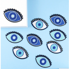 Load image into Gallery viewer, Crafted with precision, our patches feature rows of these mesmerizing eyes, meticulously designed to add an element of mystique and charm to your clothing, accessories, or home decor. The intricate detailing and vibrant colors make these patches an eye-catching addition to any outfit or personal space. from elementah.com
