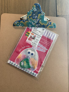 Adorable gummy drop printed treat bags with matching gummy icon tag and silver twist tie fastener.