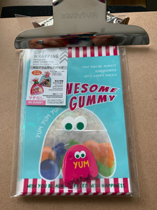 Adorable gummy drop printed treat bags with matching gummy icon tag and silver twist tie fastener.
